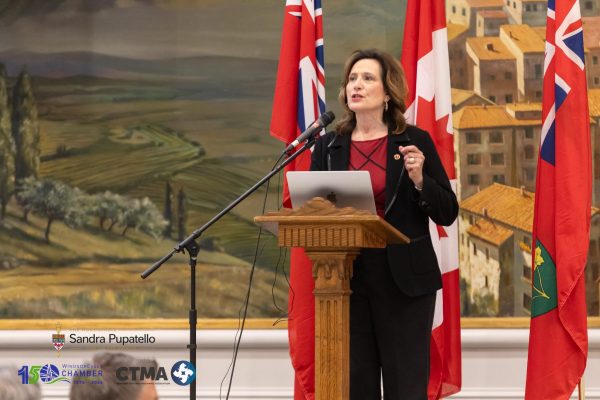 Senator Sandra Pupatello addresses attendees at The Defence Shift, highlighting the importance of collaboration between government, industry, and manufacturers to strengthen Canada's defence supply chain and create new opportunities for Windsor-Essex businesses.